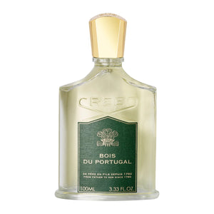 Creed - Bois du Portugal Parfumflakon mit grünem Label und goldfarbenem Verschluss vor weißem Hintergrund