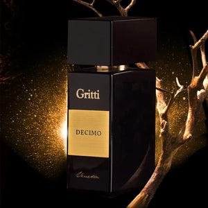 Gritti - Black Collection - Decimo Flakon in elegantem Schwarz mit goldenem Etikett vor mystischem dunklem Hintergrund