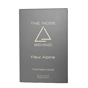 The Nose Behind - Fleur Alpine edle graue Verpackung mit goldener Schrift und minimalistischem Logo auf weißem Hintergrund