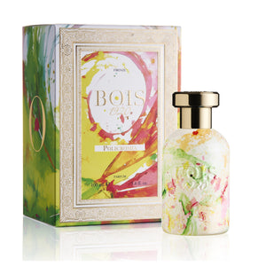 Bois 1920 - Artistic Collection - Policromia Marmorierter Flakon mit goldenem Verschluss und bunter Verpackung vor weißem Hintergrund