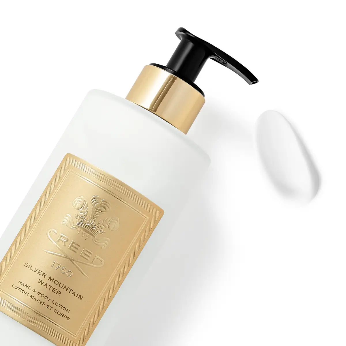 Creed - Silver Mountain Water - Hand & Body Lotion mit goldfarbenem Verschluss und zartem Pflegecreme-Tupfer