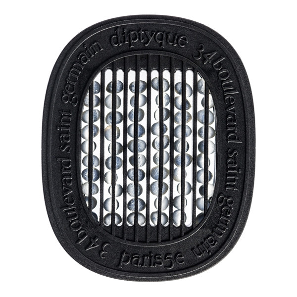 Diptyque - Roses / Rose - Capsule mit schwarzem Gehäuse und duftenden Perlen hinter feinen Gitterstäben elegant präsentiert