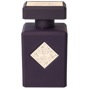 Initio - Carnal Blend - Side Effect Parfumflakon in dunkelviolettem Design mit verzierten goldfarbenen Details vor weißem Hintergrund