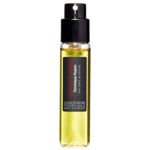 Frédéric Malle - Carnal Flower Parfumprobe mit schwarzem Sprühkopf und gelblicher Flüssigkeit vor weißem Hintergrund