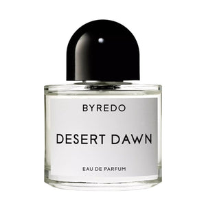 Byredo - Desert Dawn Parfumflakon in minimalistischem Design mit klarem Glas und schwarzem, rundem Verschluss
