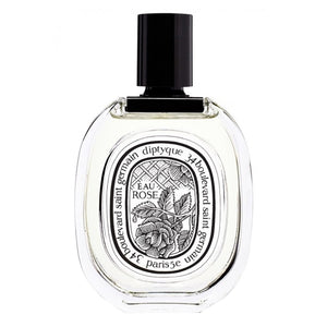 Diptyque - Eau Rose eleganter transparenter Flakon mit schwarzem Verschluss und floraler Rosengravur auf weißem Etikett