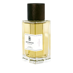 Botanicae - Epoque Parfumflakon mit goldfarbenem Duft und dunkelbraunem Holzverschluss vor weißem Hintergrund