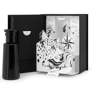 Argentum - Explorer - Earth schwarzer Flakon neben kunstvoll gestalteter schwarz-weißer Box mit Leopard und Kompass