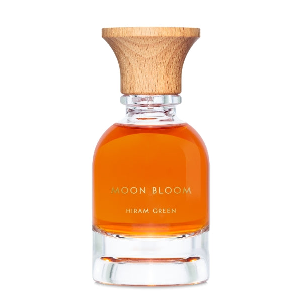 Hiram Green - Moon Bloom Duftflakon mit klarer Form und naturfarbenem Holzverschluss, warmes bernsteinfarbenes Parfum inside