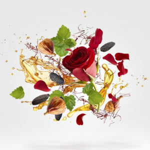 Xerjoff - Blends - Duran Duran - NeoRio / Orange Duftkomposition mit Rose, Vanille, Safran und grünen Blättern vor hellem Hintergrund