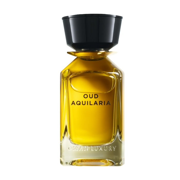 Omanluxury - Oud Aquilaria Parfümflakon mit goldfarbenem Inhalt und markantem schwarzem Verschluss vor weißem Hintergrund