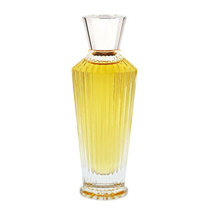 Neela Vermeire Créations - Rahele Parfumflakon in facettiertem klaren Glas mit goldgelbem Duft vor weißem Hintergrund