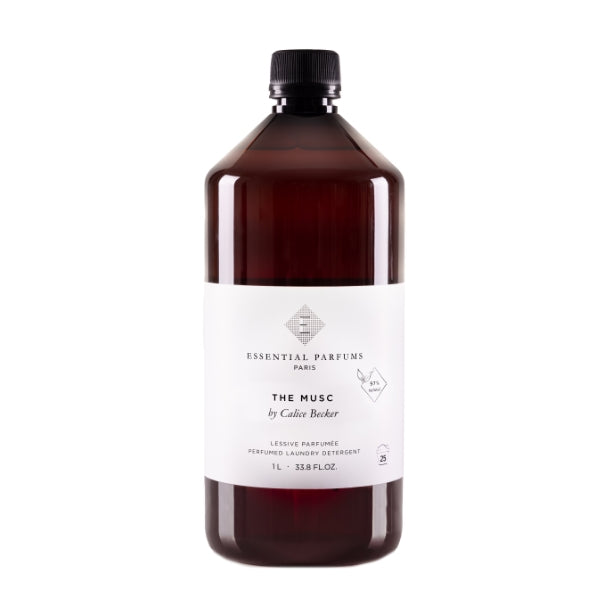 Essential Parfums - The Musc - Laundry Detergent in brauner Flasche mit schlichtem weißem Etikett für duftende Wäschepflege