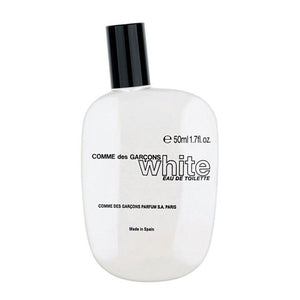 Comme des Garçons - White Parfumflakon mit klarem, schlichtem Design und schwarzem Verschluss vor weißem Hintergrund