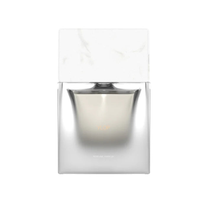 Sora Dora - White Collection - Ylop Parfümflakon mit weißem Marmorverschluss und transparentem Glas vor hellem Hintergrund