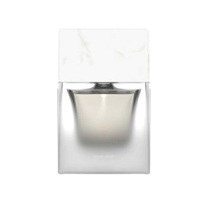 Sora Dora - White Collection - Ylop Parfümflakon mit weißem Marmorverschluss und transparentem Glas vor hellem Hintergrund