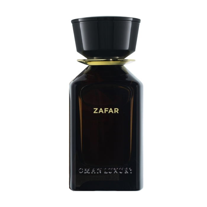 Omanluxury - Zafar Parfümflakon in dunkelbraunem Glas mit goldenem Schriftzug und elegantem schwarzem Verschluss vor weißem Hintergrund
